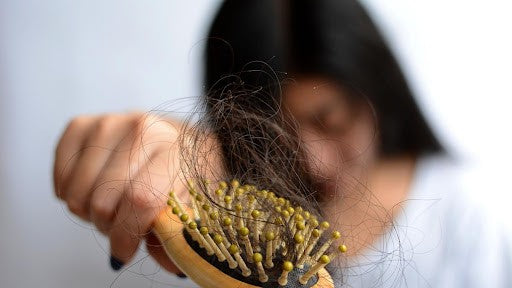 How to Control Hair Fall for Women? | Mamaearth